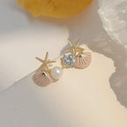 アシンメトリーなシェルピアス ピンク