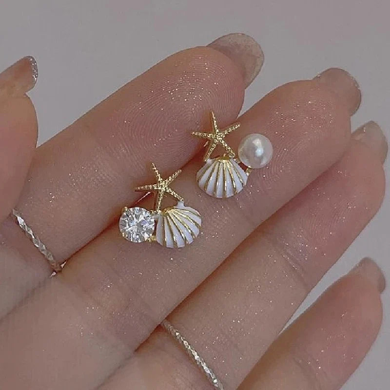 アシンメトリーなシェルピアス ホワイト