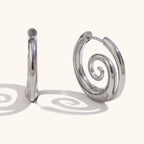 Boucles d'oreilles créoles avec motif spirale argent