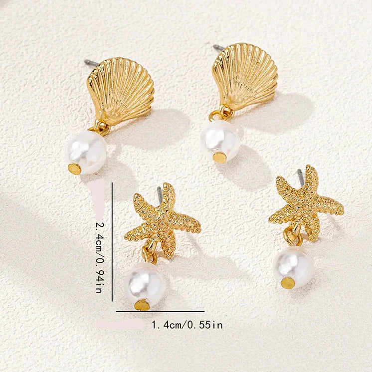 ゴールドカラーの貝殻とパールのピアス