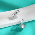 Boucles d’oreilles Étreinte d’Étoiles Filantes Moissanite