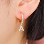 Boucles d'oreilles créoles avec initiale femme