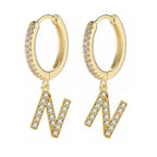 Boucles d'oreilles créoles avec initiale femme n