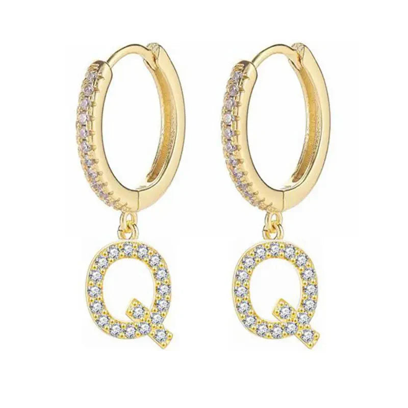Boucles d'oreilles créoles avec initiale femme q