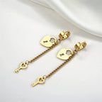 Boucles d'oreilles pendantes clef et cadenas or