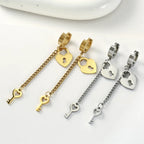 Boucles d'oreilles pendantes clef et cadenas or