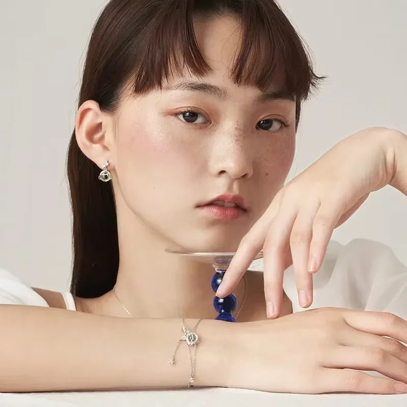 ムーンストーン風クリスタルとジルコンの星モチーフブレスレット
