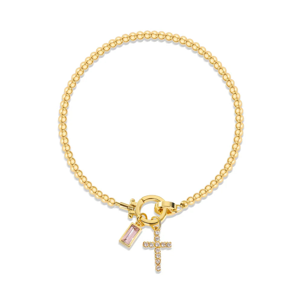 Bracelet avec croix et pierre de naissance