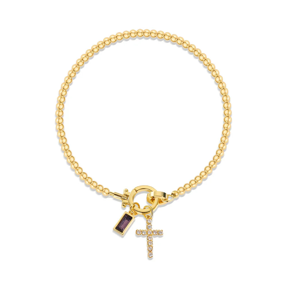 Bracelet avec croix et pierre de naissance