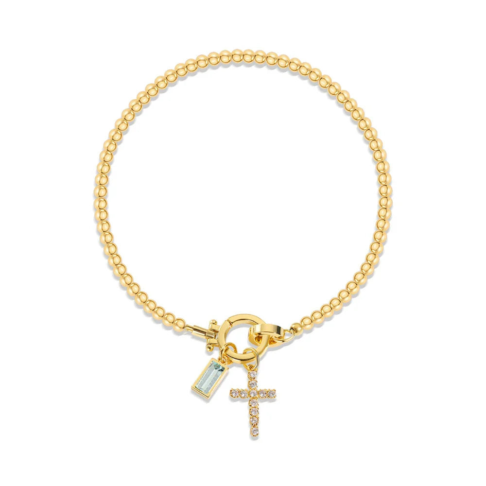 Bracelet avec croix et pierre de naissance
