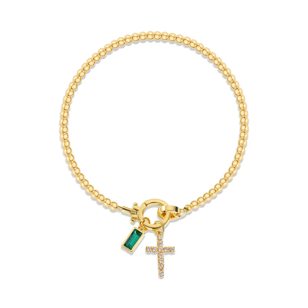 Bracelet avec croix et pierre de naissance