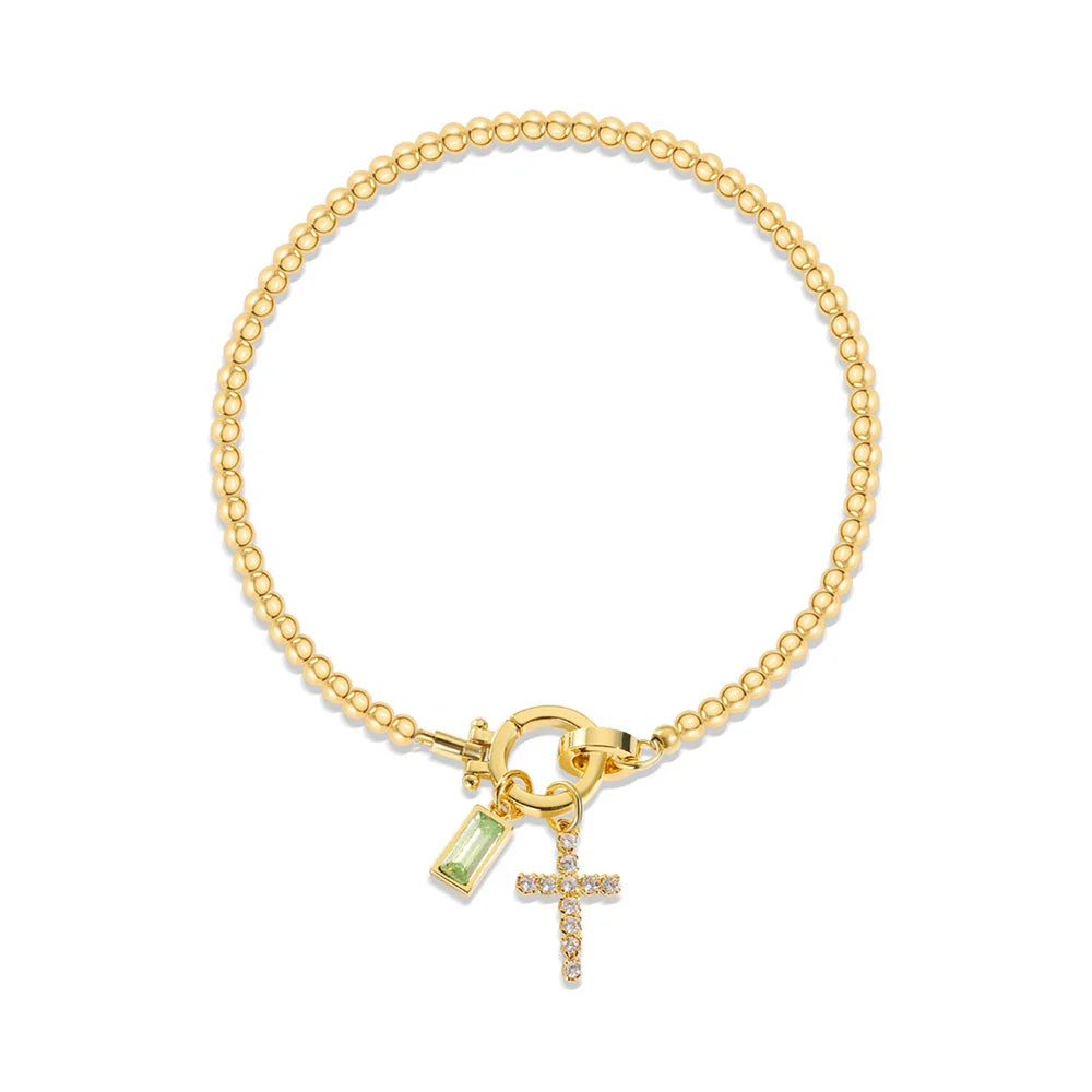 Bracelet avec croix et pierre de naissance