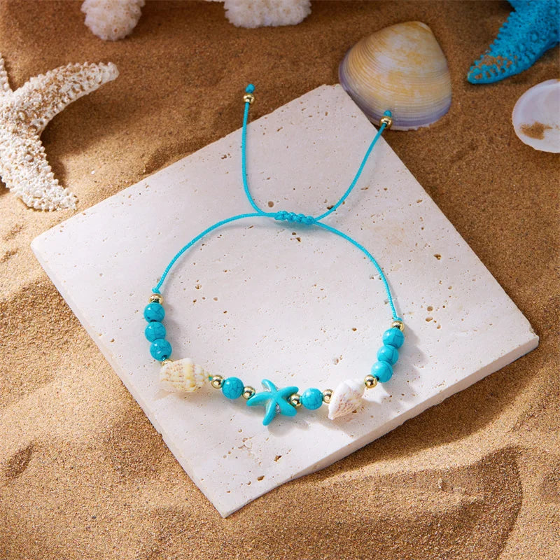 Bracelet cordon avec coquillage et étoile de mer bleu étoile