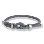 Bracelet moderne en corde tressée avec nœud gris
