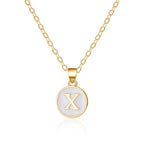 Collier avec pendentif blanc initiale x