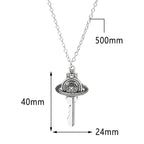 Collier avec pendentif clef de l'univers
