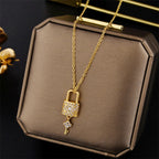Collier avec pendentif clef et cadenas or