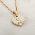 Collier avec pendentif coeur blanc initiale h