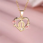 Collier avec pendentif initiale coeur et fleurs o