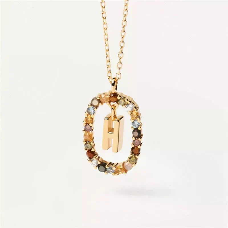 Collier avec pendentif ovale initiale h