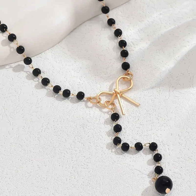 Collier de Perles avec Pendentif Noeud noir