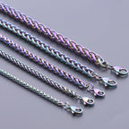 Collier Torsadé avec pendentif arc-en-ciel