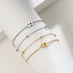 ゴールドとシルバーのダブルイニシャルブレスレット s