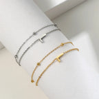 ゴールドとシルバーのダブルイニシャルブレスレット l