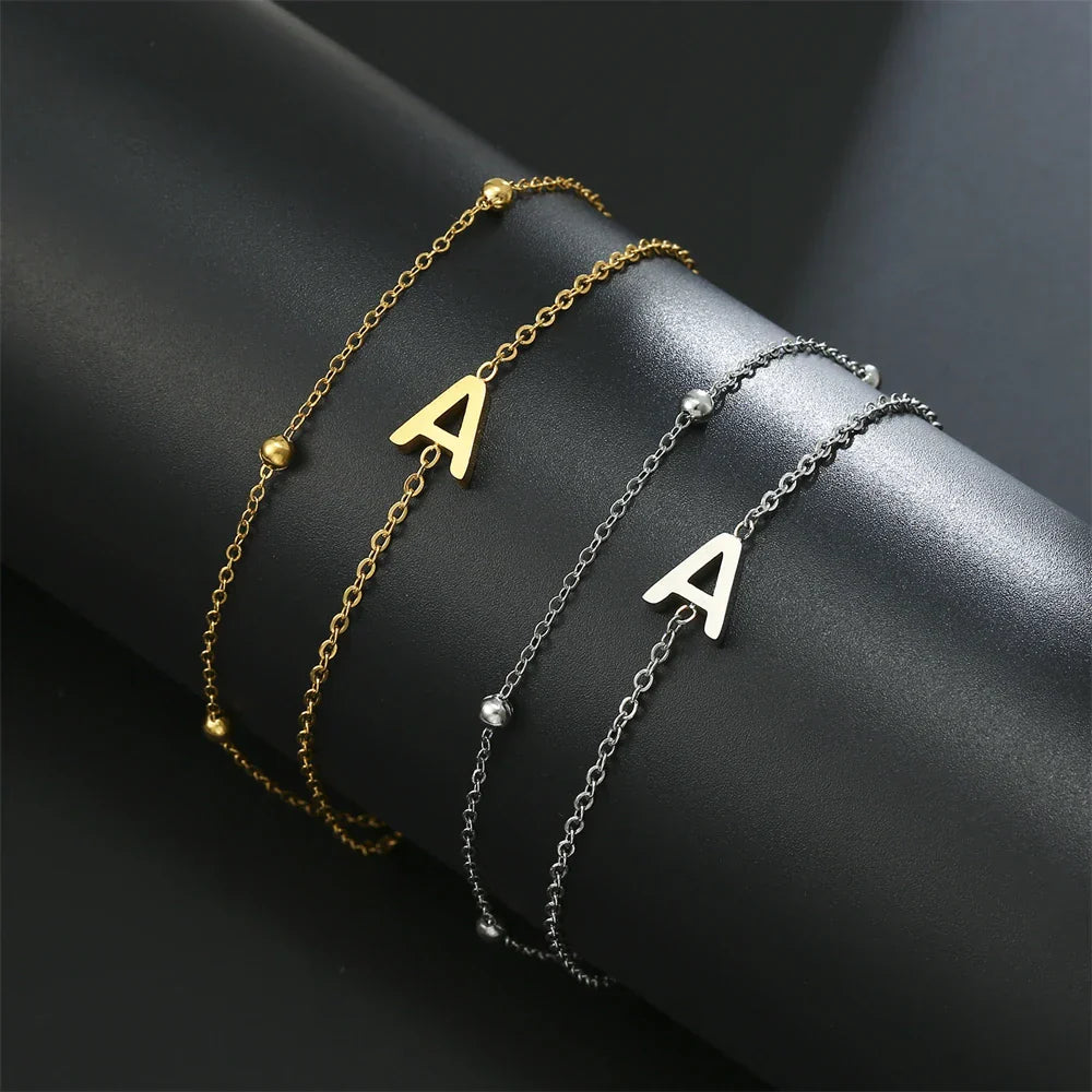 ゴールドとシルバーのダブルイニシャルブレスレット a