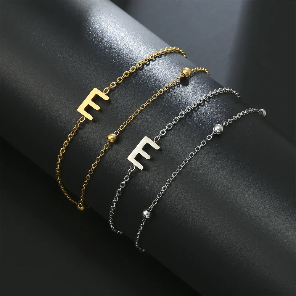 ゴールドとシルバーのダブルイニシャルブレスレット e