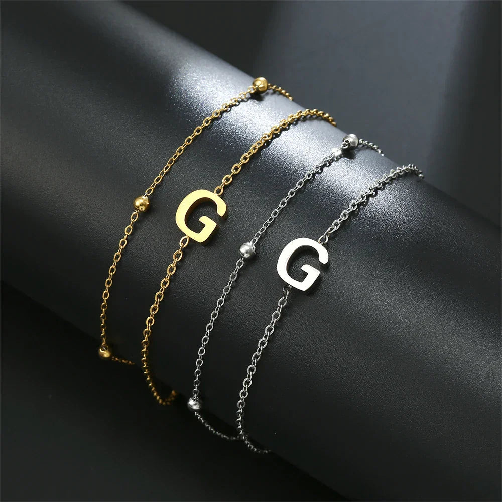 ゴールドとシルバーのダブルイニシャルブレスレット g