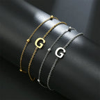 ゴールドとシルバーのダブルイニシャルブレスレット g