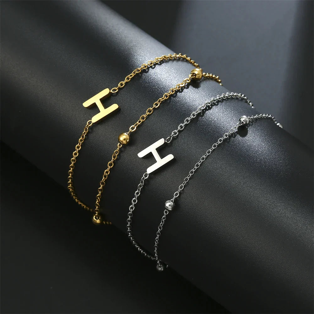 ゴールドとシルバーのダブルイニシャルブレスレット h