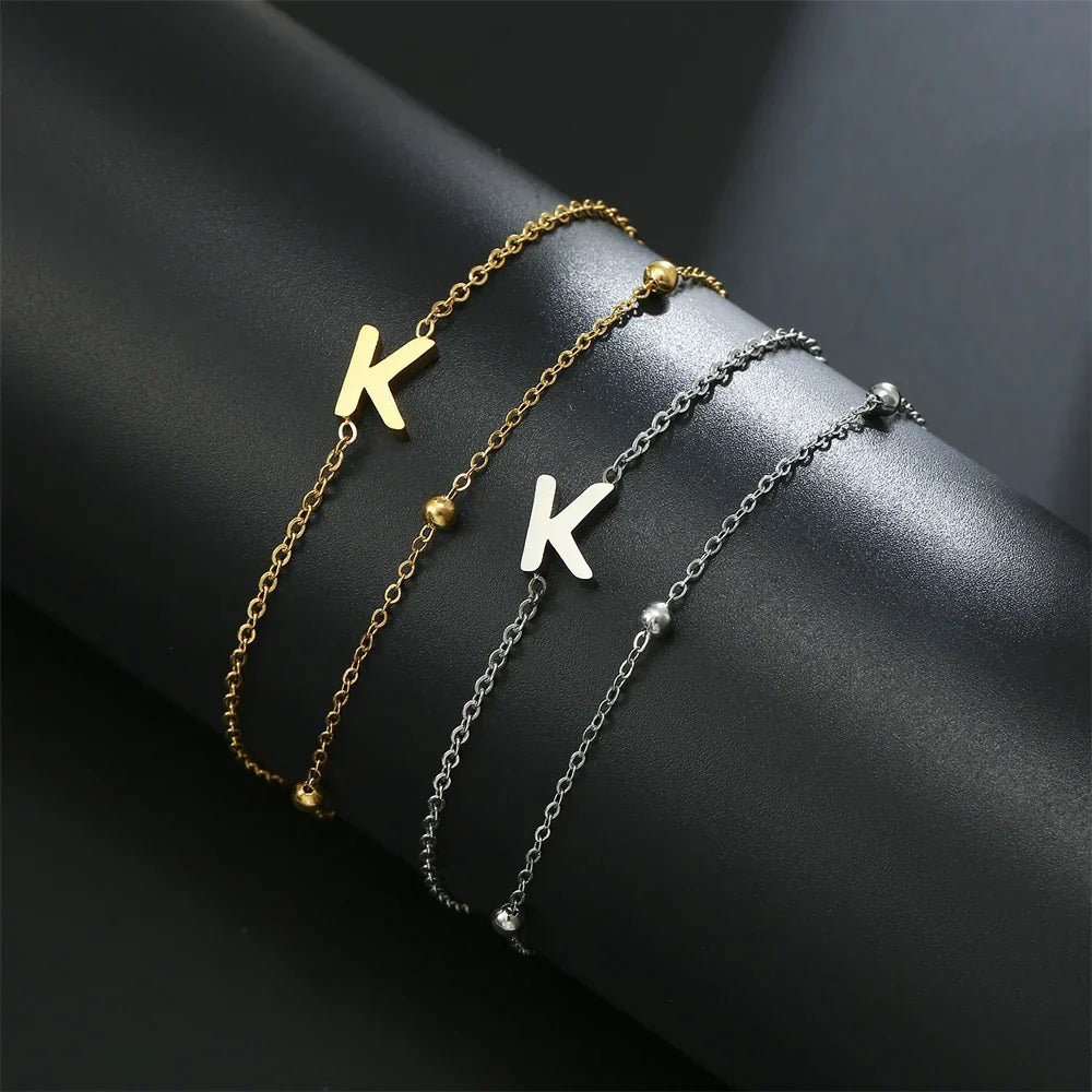 ゴールドとシルバーのダブルイニシャルブレスレット k