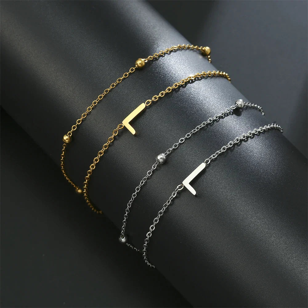 ゴールドとシルバーのダブルイニシャルブレスレット l