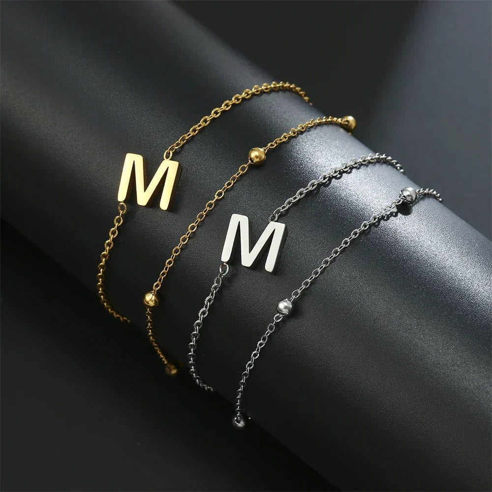 ゴールドとシルバーのダブルイニシャルブレスレット m