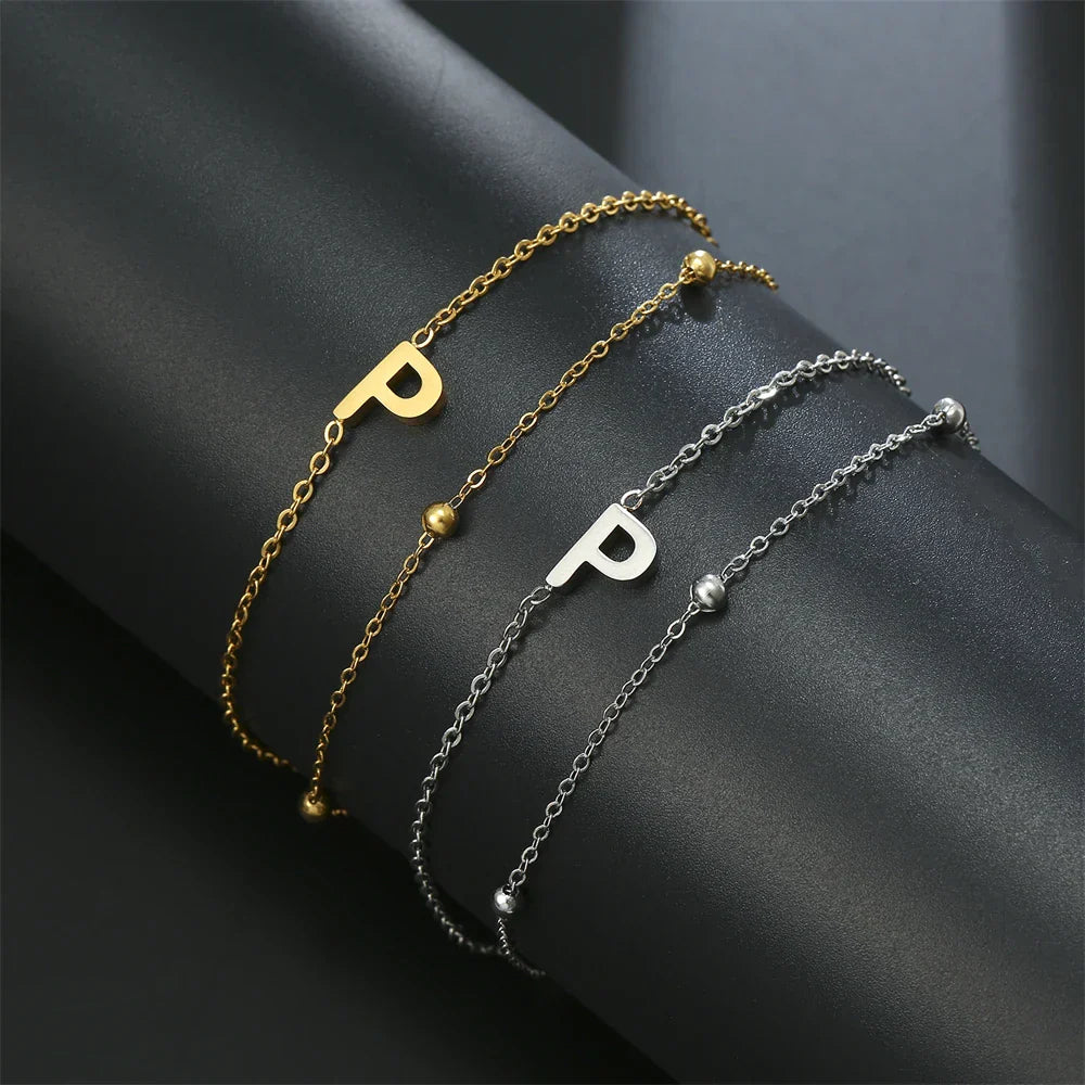 ゴールドとシルバーのダブルイニシャルブレスレット p
