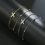 ゴールドとシルバーのダブルイニシャルブレスレット x