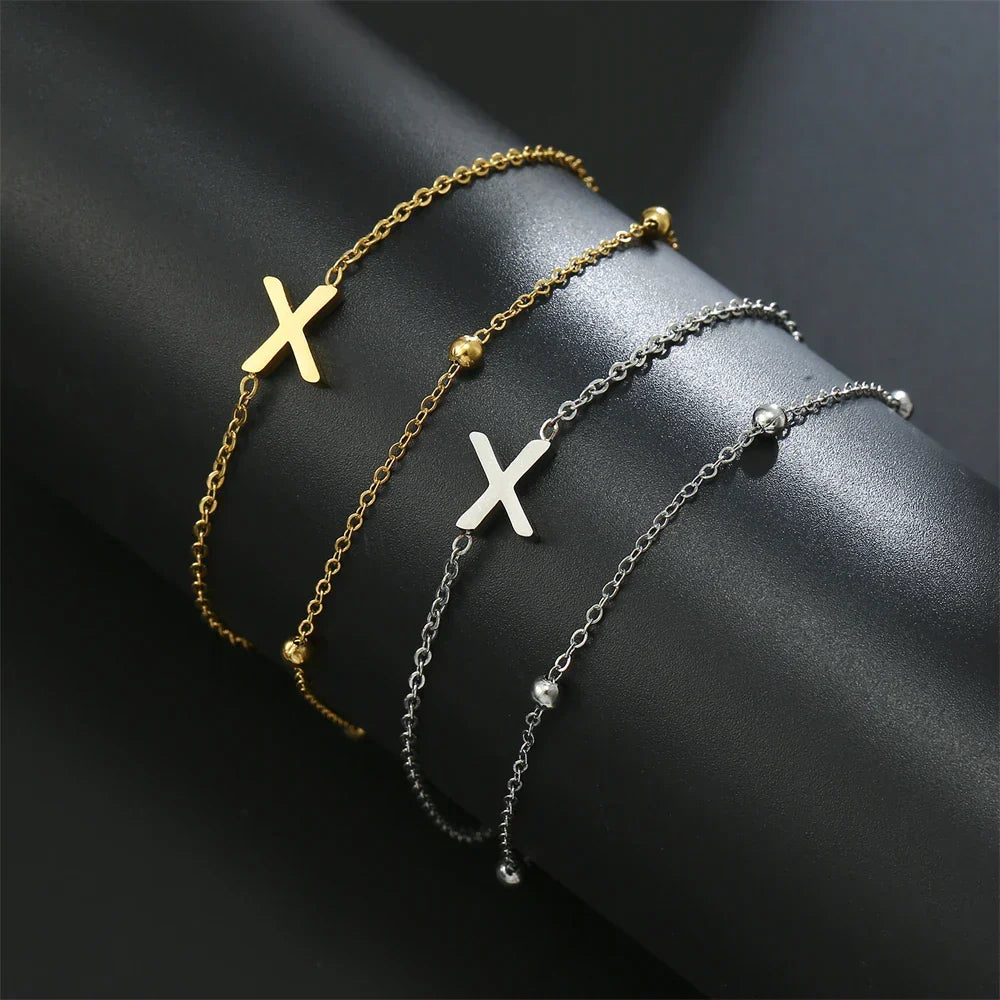 ゴールドとシルバーのダブルイニシャルブレスレット x