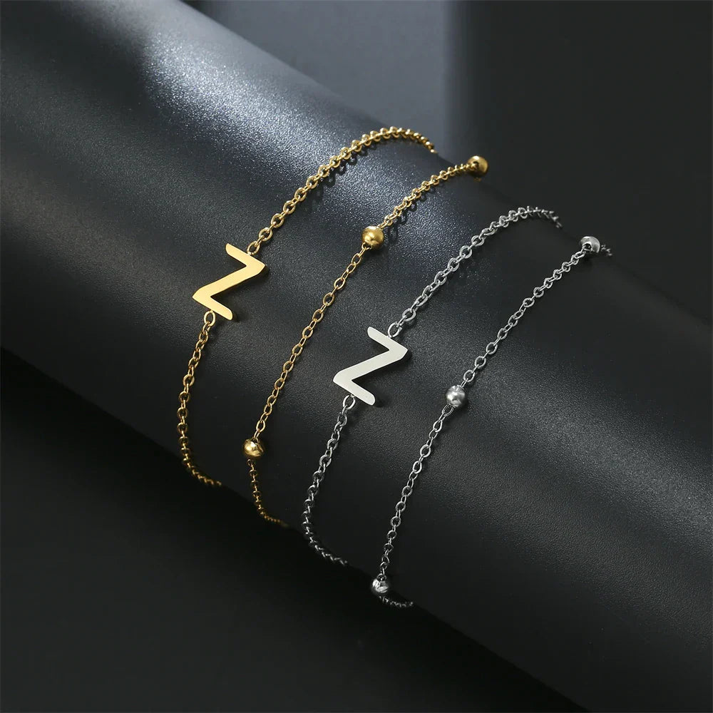 ゴールドとシルバーのダブルイニシャルブレスレット z